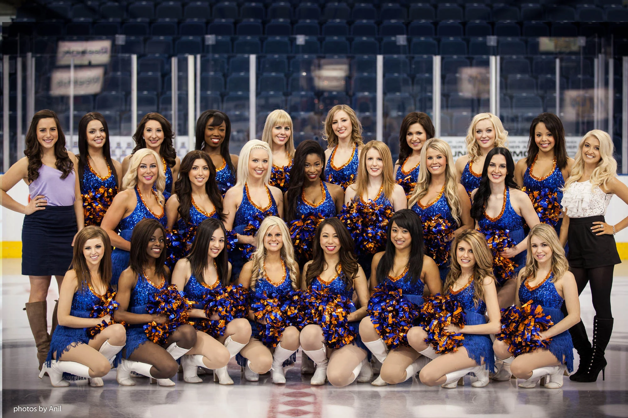The Oilers Octane dance team posed together in matching uniforms at the rink